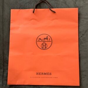 Authentic Hermes Bold Orange Bag with Iconic Emblem